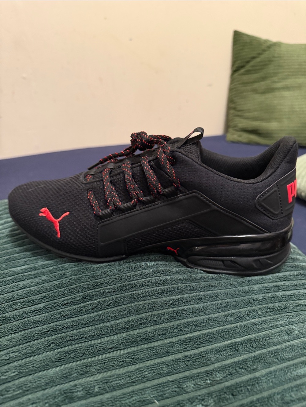 Puma Men’s Black Athletic Shoes with Red Accents